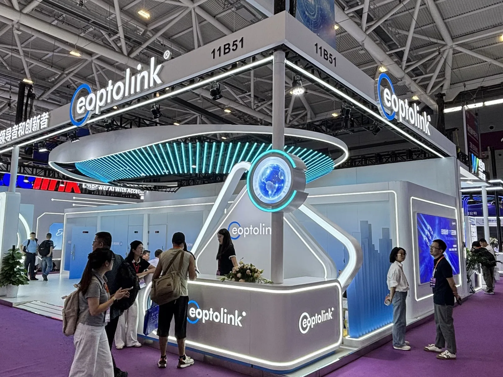 Photograph of the Eoptolink (Essenlight) booth at CIOE 2026 showcasing global all-optical interconnect solutions